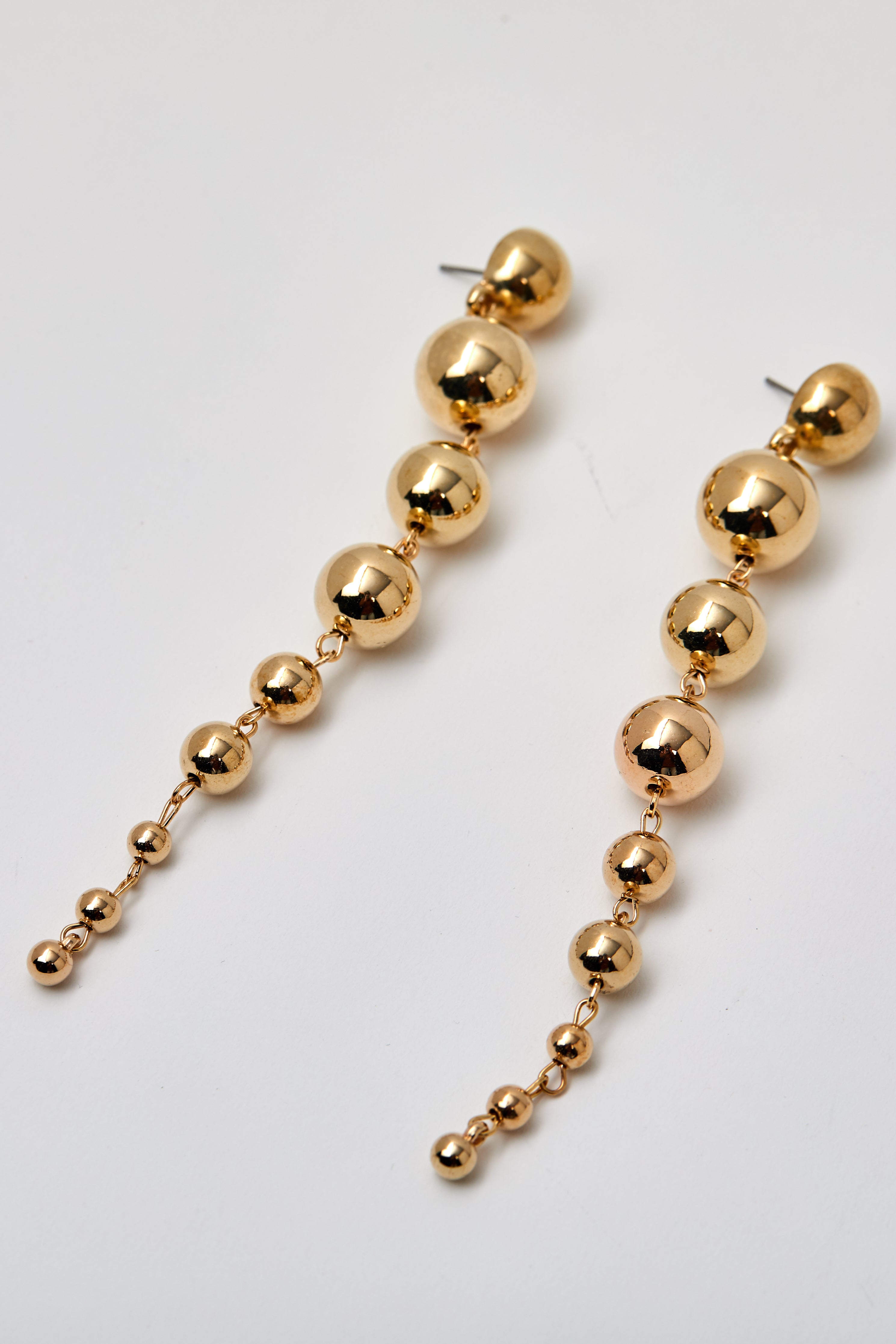 Bisjoux-Descending-Ball-Long-Sphere-Statement-Earrings-Gold